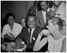 right to left : Lucille and Louis Armstrong with Erroll Garner (standing) c. 1959 - courtesy of Harold Hopkins