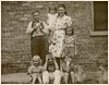 Aunt Judy holding Ida, with Francene at her Aunt's left and Franklin below (all children of Frank Melrose) c. late 1941 - courtesy of Ida Melrose Shoufler